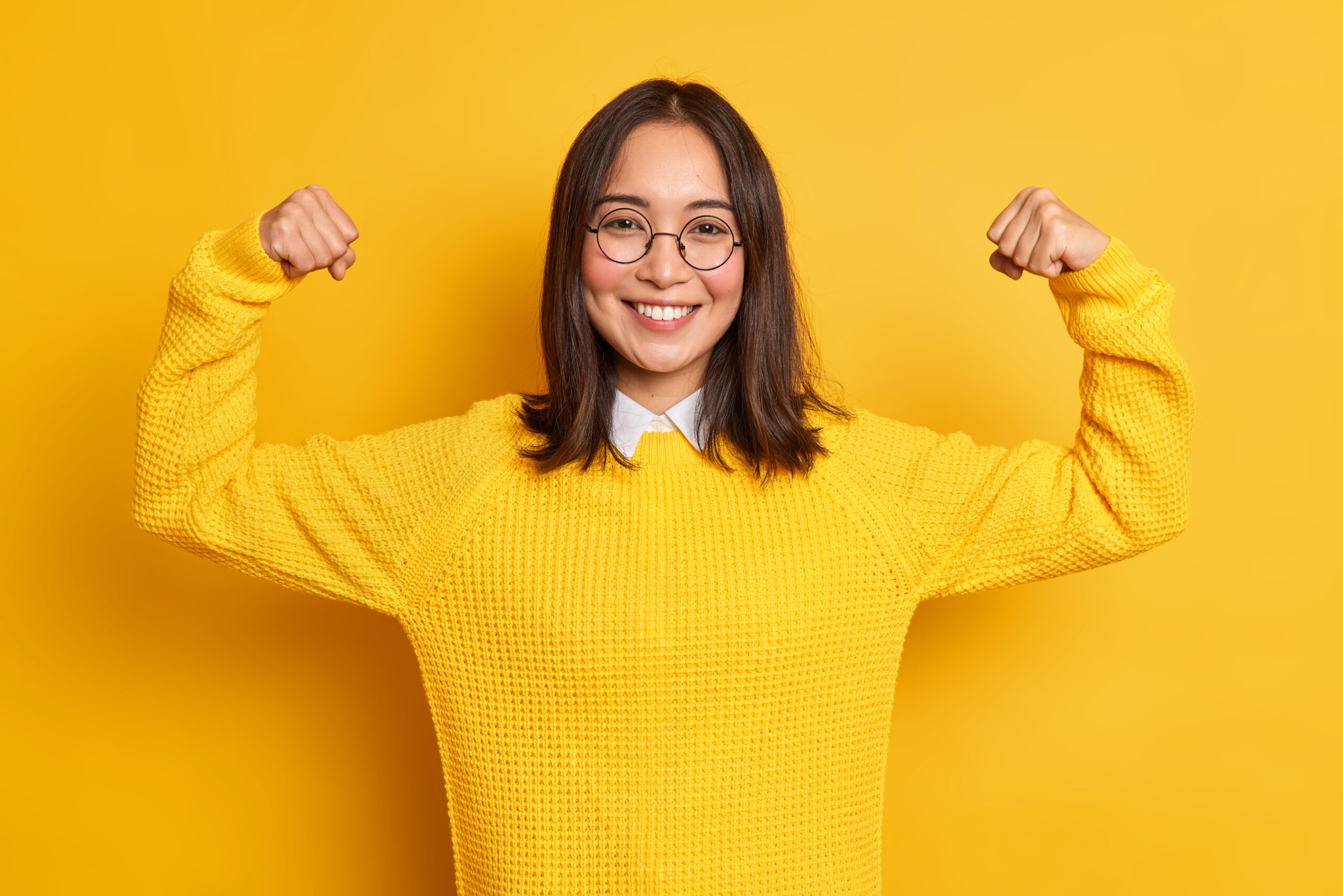 Woman with yellow sweater